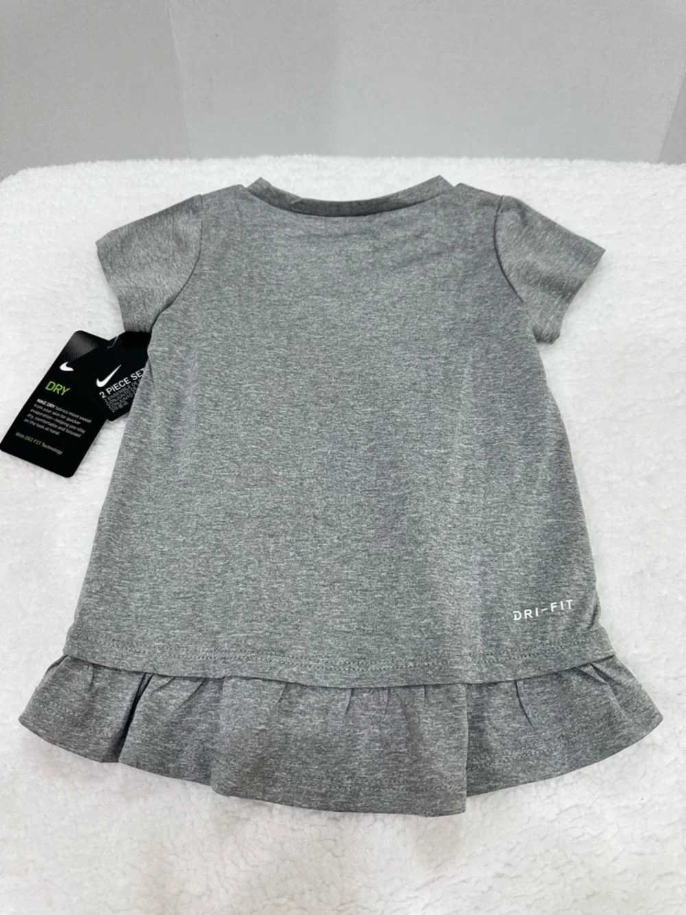 Girl’s Nike Gray Graphic Tee with Light Pink Polka Dot Skort - Picture 5 of 10